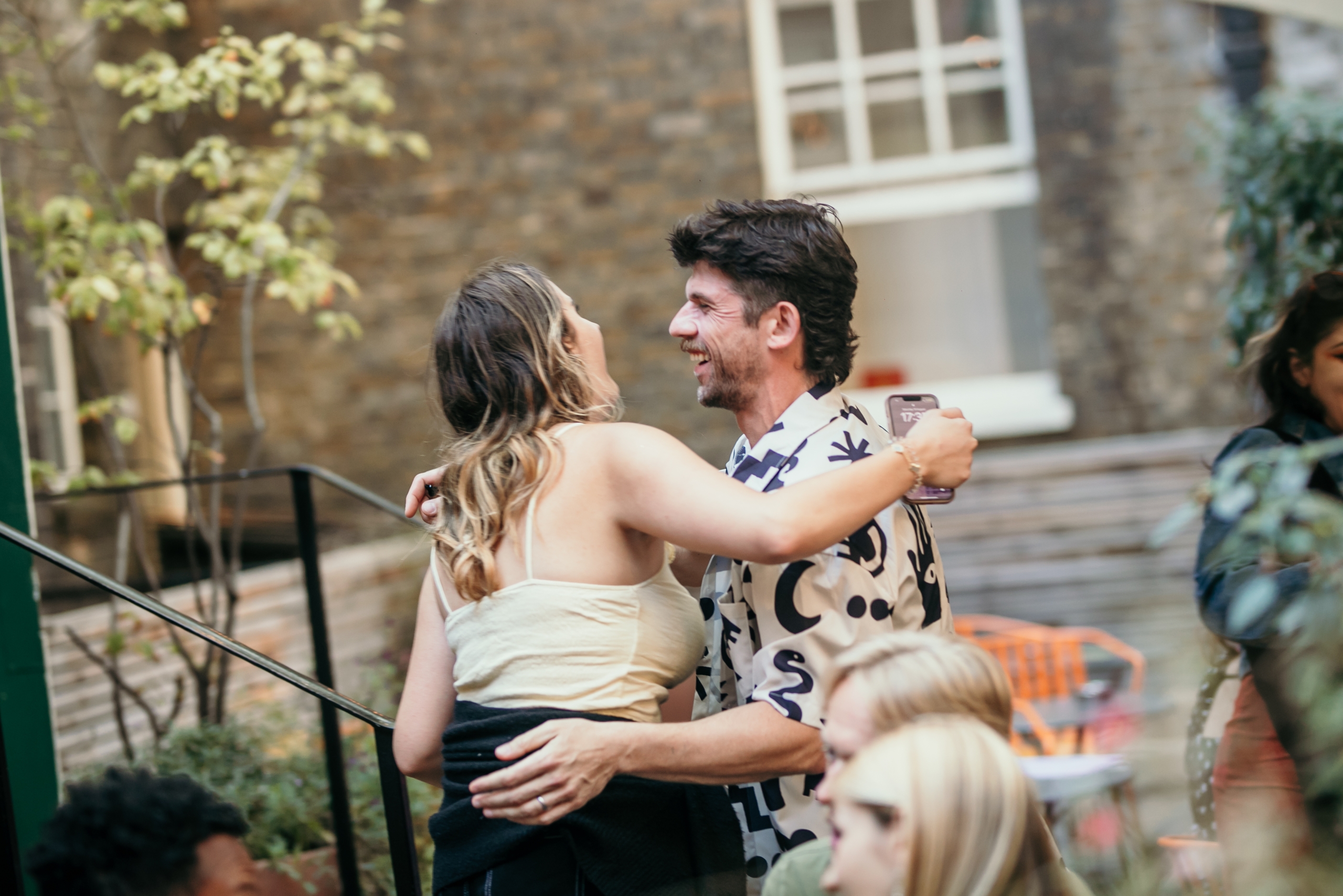 Photo of two friends hugging